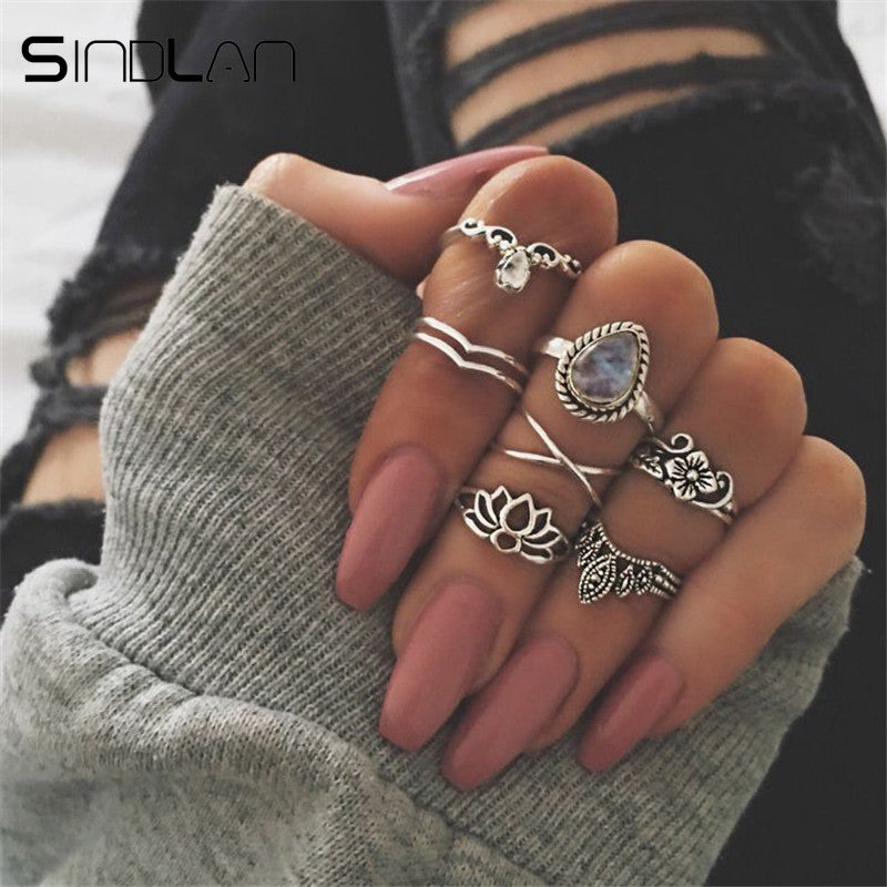 Sindlan 7PCs Rhinestone Lotus Charm Rings for Women Retro Silver Flower Crown Statement Rings Set Joint Finger Ring Jewelry